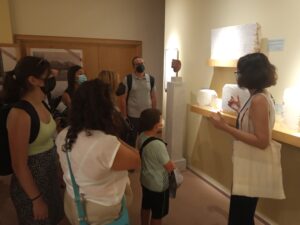 Natassa guiding during a tour in the museum of Abdera